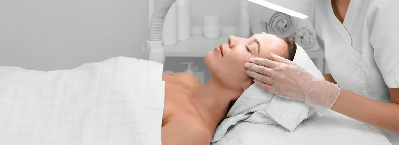 A woman having a facial treatment